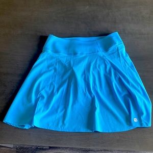 Light blue puma tennis skirt. Size M/L. Worn once. With pockets.